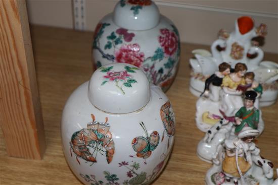 Two Chinese famille rose ginger jars and covers height 15cm